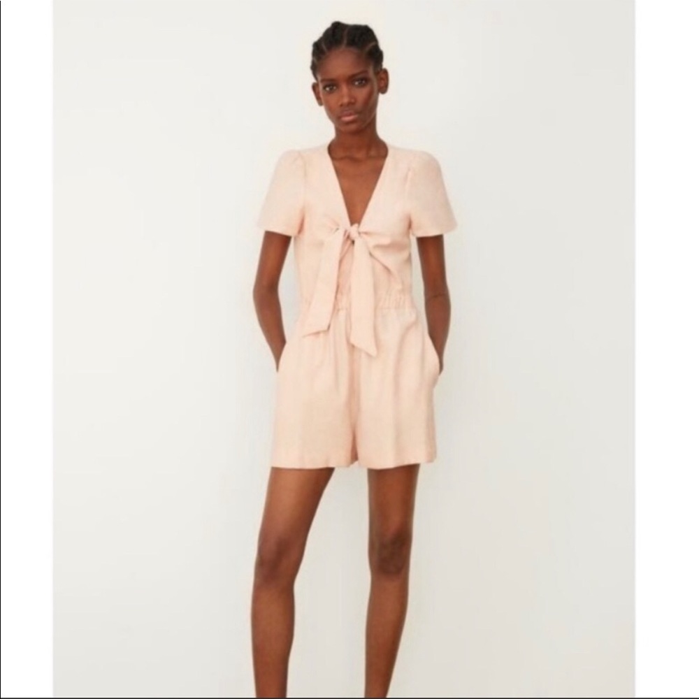 Pink Zara romper. V neck, tie in front
